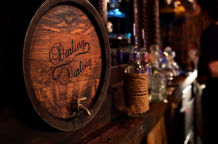Image of a cask and dark bar. 