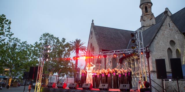 Carol singers on stage in Walyalup Koort