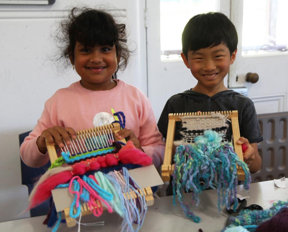 Two kids completing craft activities at Fremantle Arts Centre