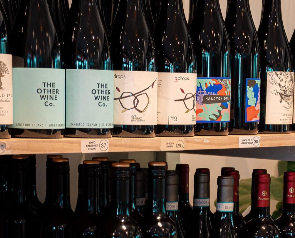 photo of shelf of wine