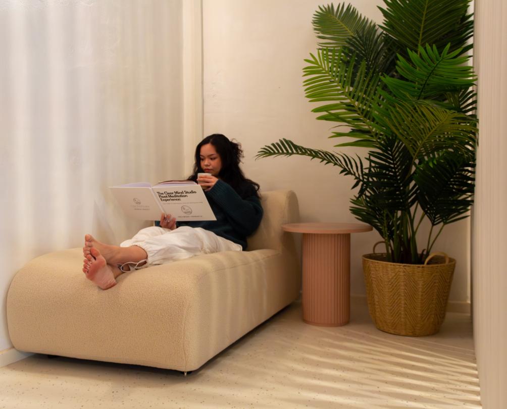 relaxing on a couch at Clear Mind Studio Fremantle