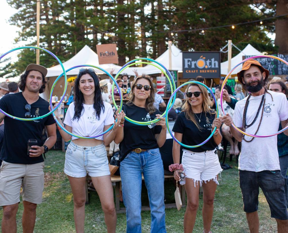 Fremantle BeerFest with five friends holding up hula hoops and smiling at the camera