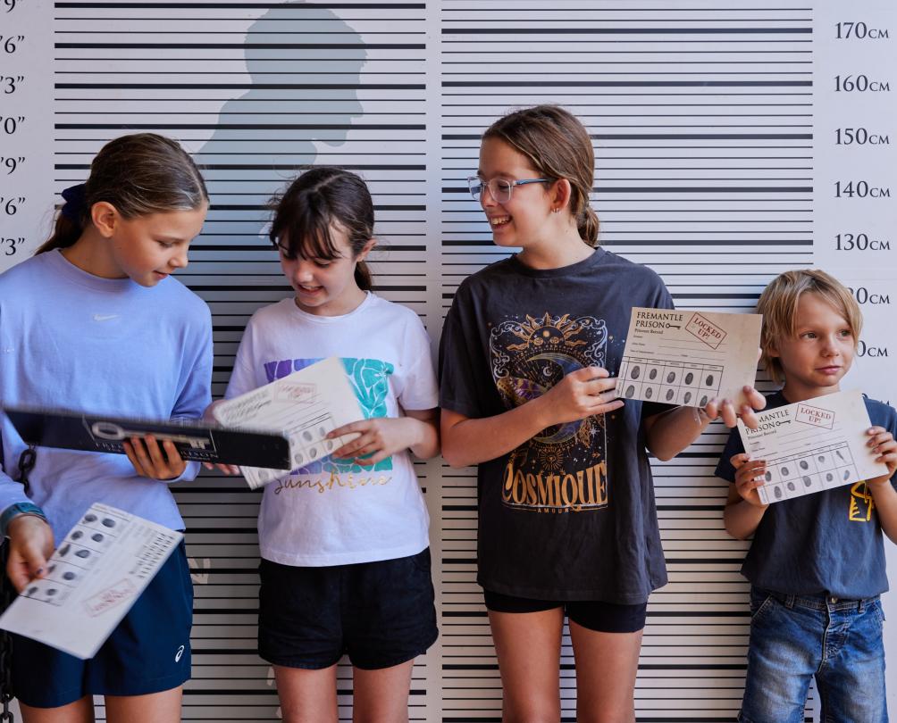 Four children at Fremantle Prison on a school holiday tour - captured by Jess Wyld 