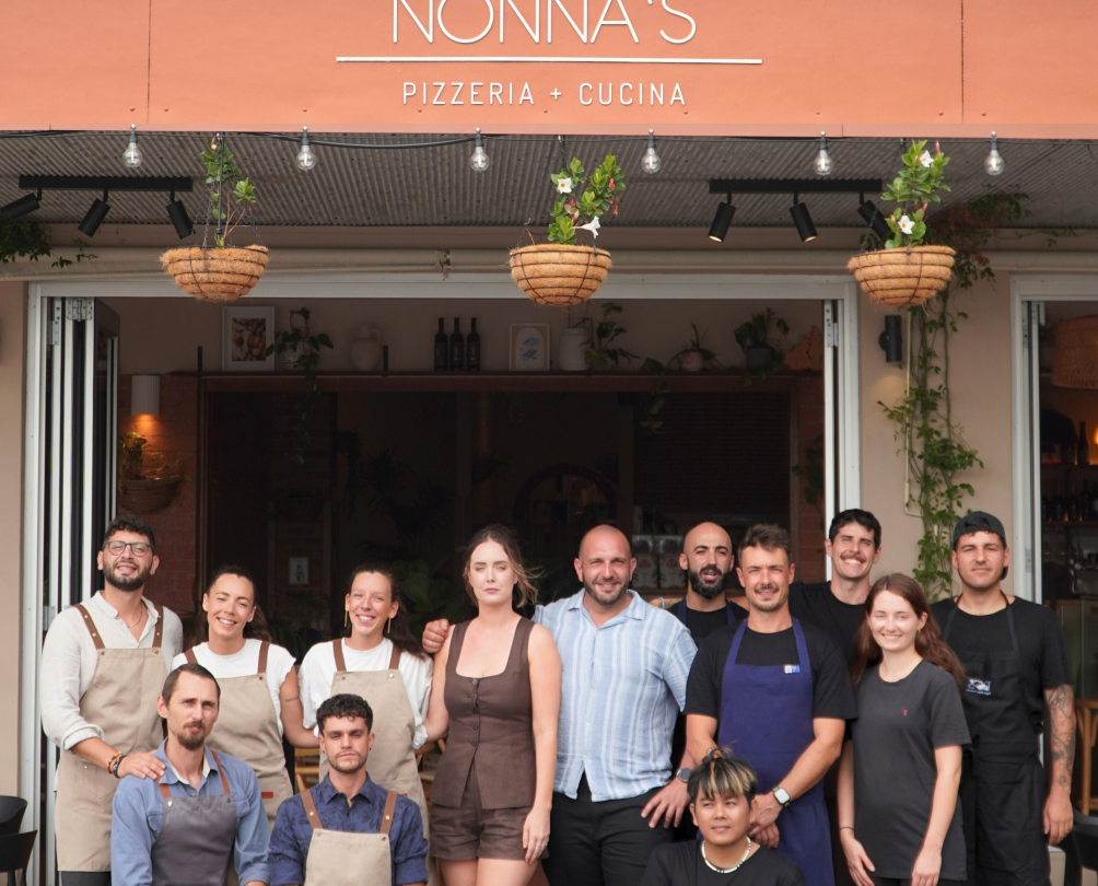 Nonna's staff in front of restaurant.