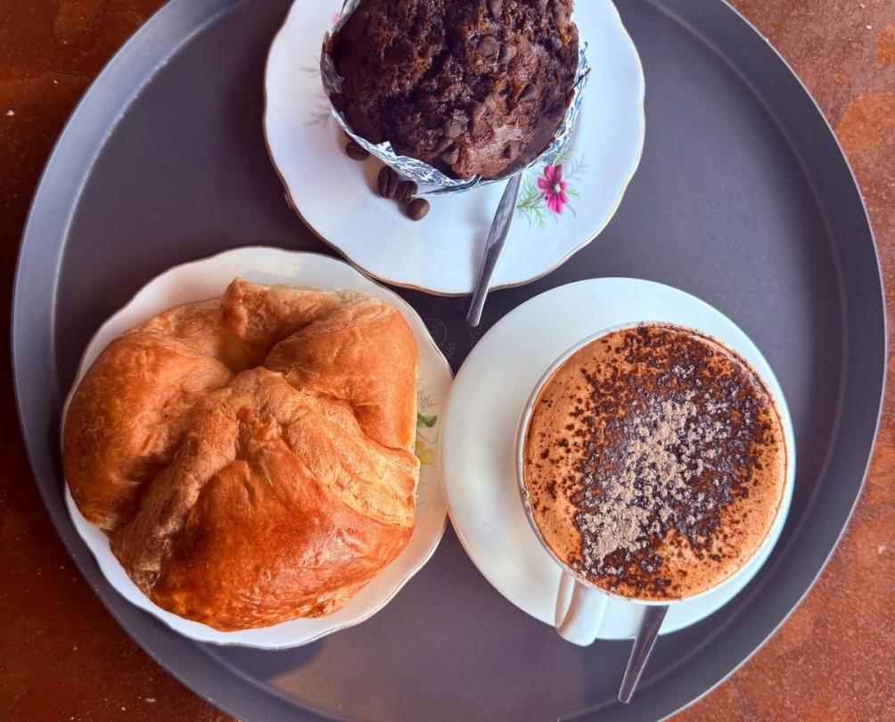 Coffee, pastry, and a chocolate muffin at the Pickled Poppy restaurant Fremantle.