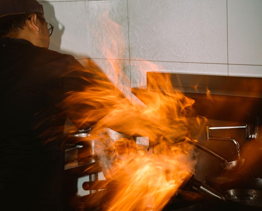 Cooking with fire at Moon and Mary.