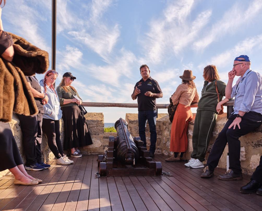 group watching the cannon being fired 
