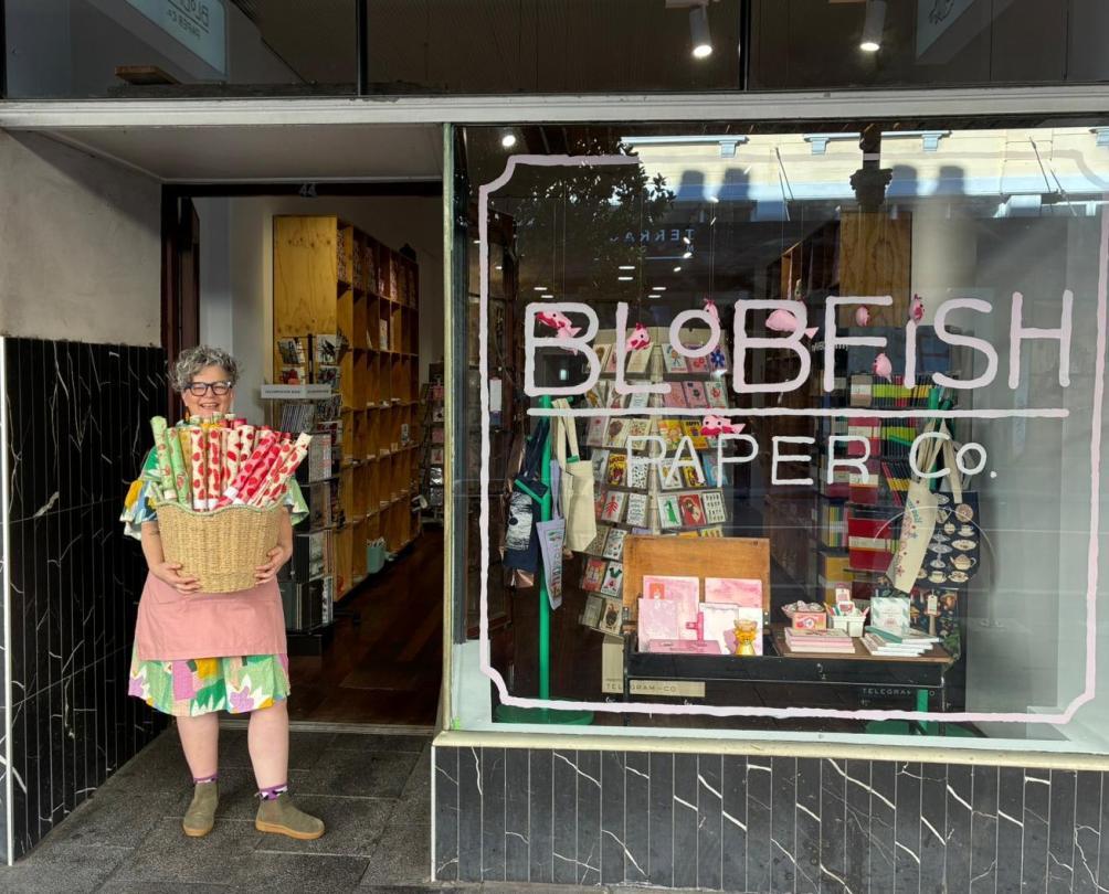 owner Kristy standing outside of her store Blobfish Paper Co. 
