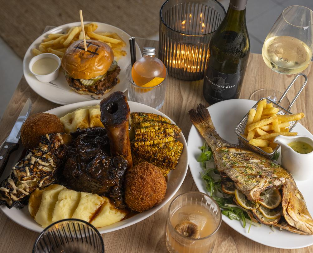 plates of food on a table with drinks