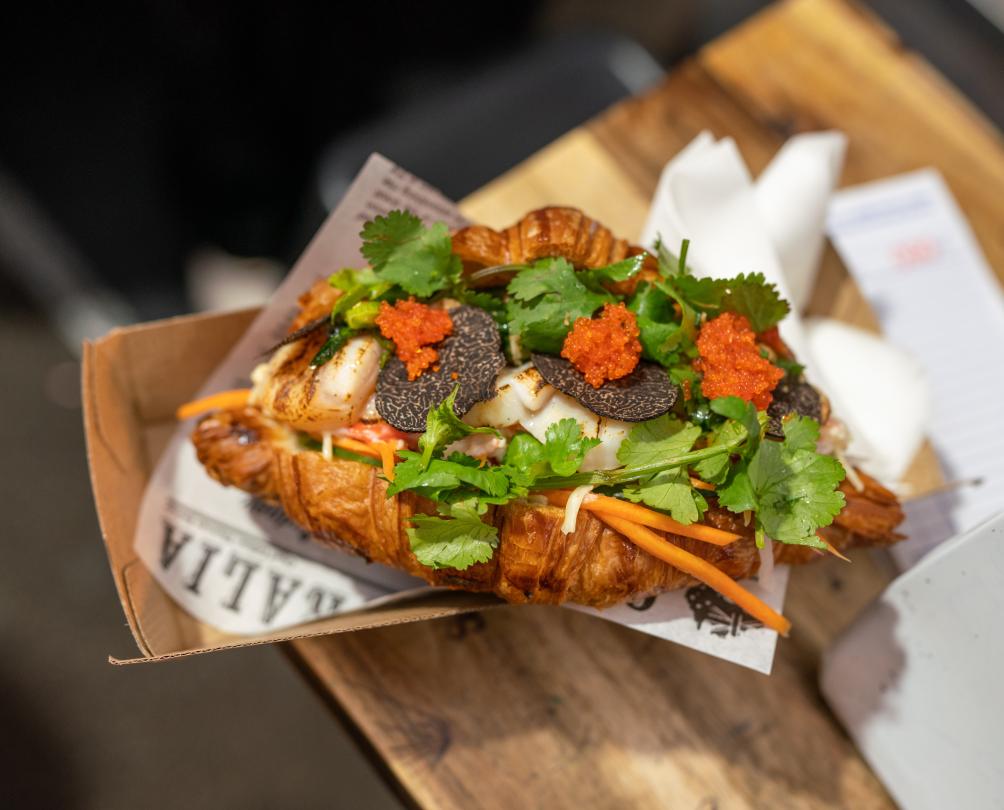 truffle bahn mi in someone's hands