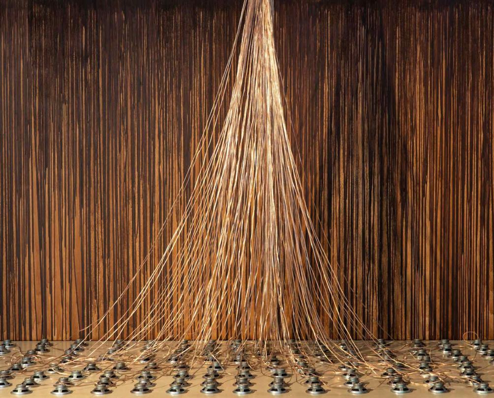 wires coming down from a wall at Vessel Art exhibiton