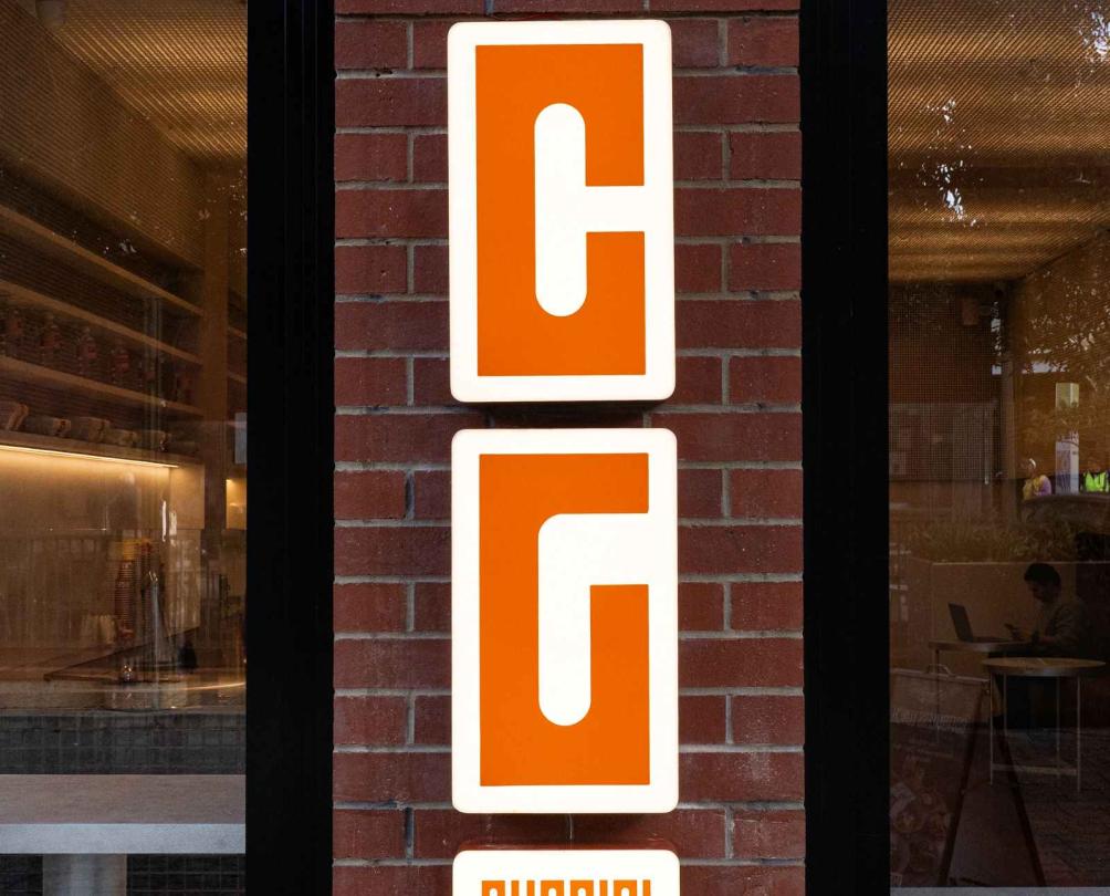 The Cuccini Gelato light up sign outside the store 