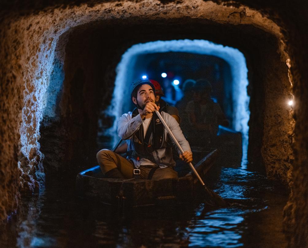 someone on a tunnels tour at the Fremantle Prison