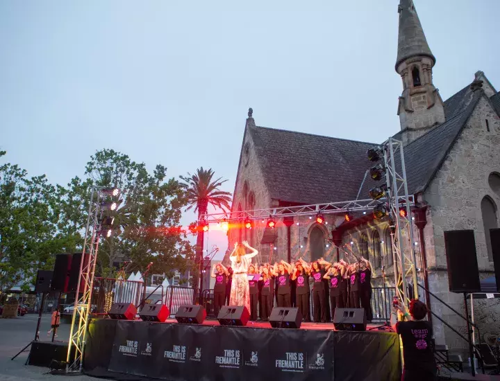 Carol singers on stage in Walyalup Koort