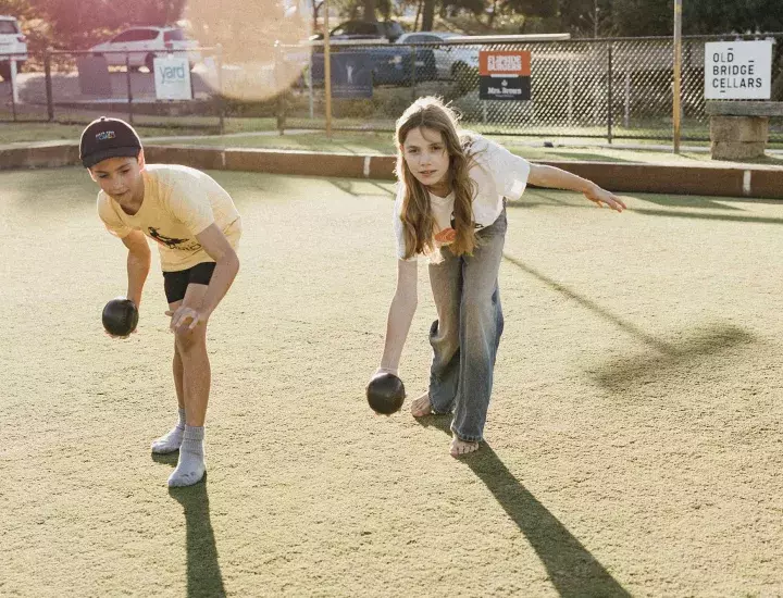 kids playing lawn bowls 