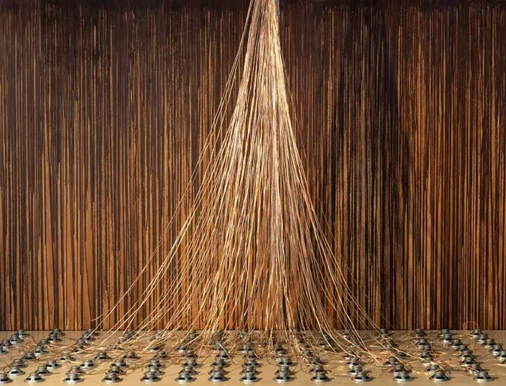 wires coming down from a wall at Vessel Art exhibiton