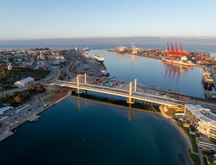 an aerial view of the Fremantle Traffic Bridge at sunrise